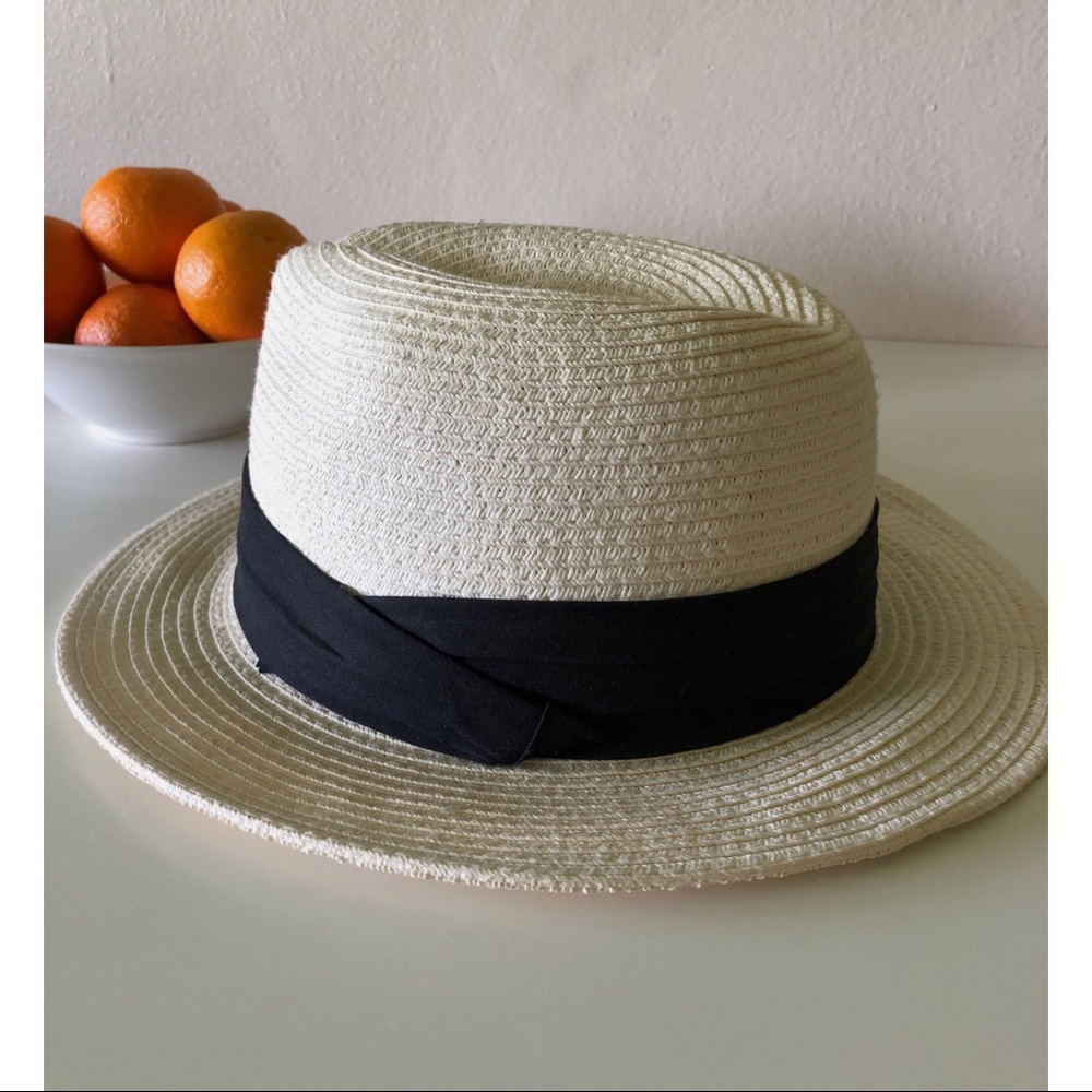 Straw hat with black trim